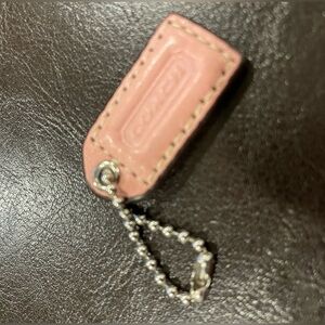 Coach light pink leather hang tag